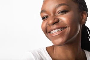 photo of a black teenager with beautiful braces