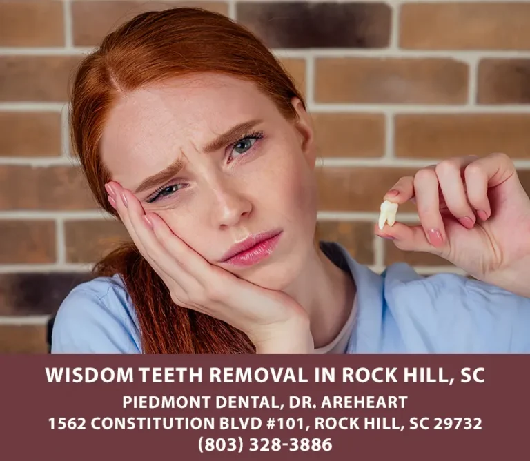 Young lady holding a wisdom tooth after she had it removed